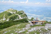 Hiker Enjoying The View From The Salzburger Hochthron To Geiereck Mountain Peak, The Hochalm Restaur
