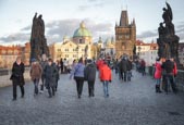 Tourists Walk On The Charles Bridge, Prague, Czech Republic