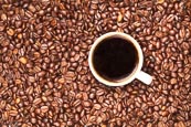 Thumbnail image of Cup of coffee with coffee beans