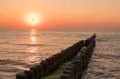 Thumbnail image of sea with groynes at sunset at Ahrenshoop, Mecklenburg-Vorpommern, Germany
