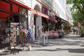 Bergmannstrasse In Kreuzberg People Walking And Sitting Outside Knofi Feinkost Restaurant With Cloth