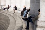 St Peters - People Relaxing On The Colonnade, Rome, Italy