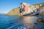 Thumbnail image of view over the town and harbour with its colourful houses in Riomaggiore, Cinque Terre, Liguria, Ital