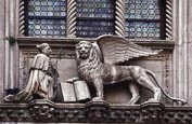 Thumbnail image of Doges Palace, Doge Foscari and Lion of St Mark, detail over Porta della Carta, Venice