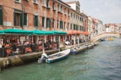 Canal With Outdoor Restaurant On Fondamenta San Lorenzo, Venice, Veneto, Italy