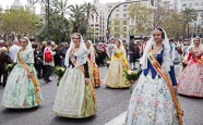 Thumbnail image of Women in traditional dress during procession at the festival of San Vicente Ferrer, the Patron Saint