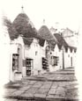Thumbnail image of Typical trullis with shops in Alberobello, Puglia, Italy