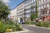 Old Buildings And Flowers On Oderberger Strasse, Prenzlauer Berg, Berlin, Germany