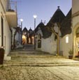 Thumbnail image of street and shops in the trulli district Rione Monti in Alberobello, Puglia, Italy