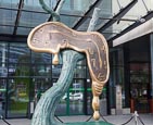 Profile Of Time, Sculpture By Salvador Dalí in Front Of The Sky Tower, Wroclaw, Poland