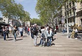 Thumbnail image of crowds walking and watching a living statue on La Rambla, Barcelona, Catalonia, Spain