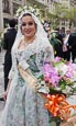 Thumbnail image of Woman in traditional dress during procession at the festival of San Vicente Ferrer, the Patron Saint